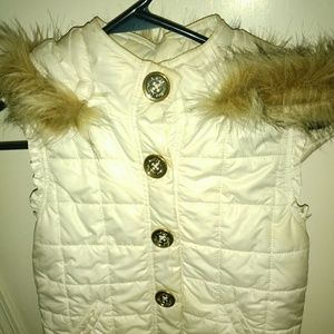 White and gold vest